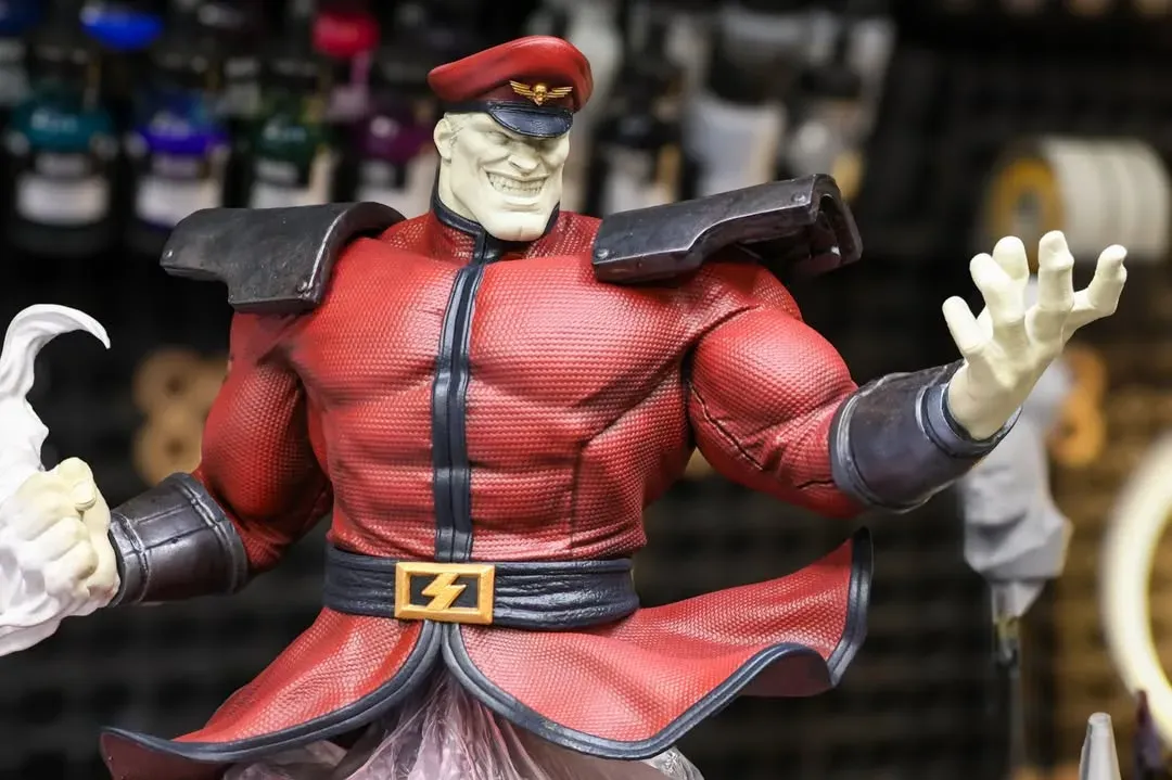 M. Bison bust progress, gold belt buckle painted