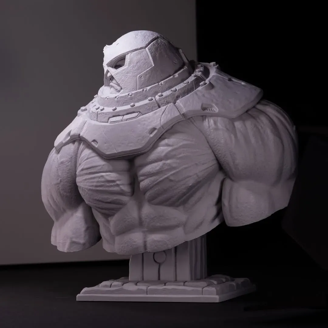Primed grey Juggernaut bust under dramatic side light with deep falloff
